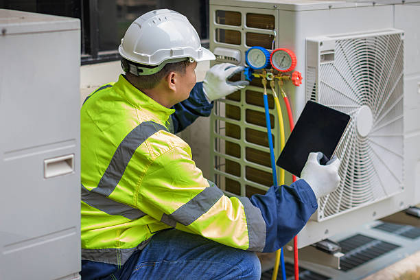 Professional Air Conditioning Repair technician working in Rexburg, ID
